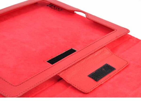 a red leather case with a strap