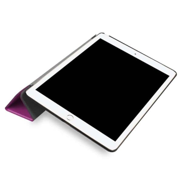 a white tablet with a purple cover