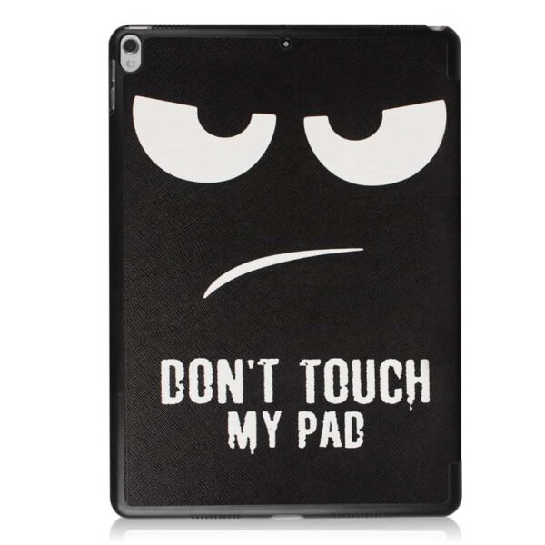 a black tablet case with a face on it