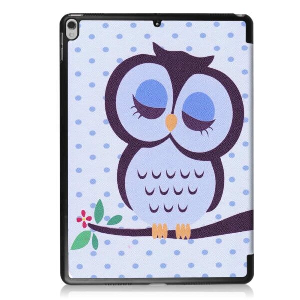 a case with a picture of an owl on it